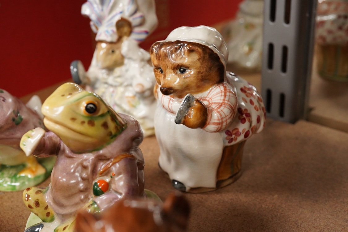 Nineteen Beatrix Potter character stamped F Warne and Co, Beswick, 10cm